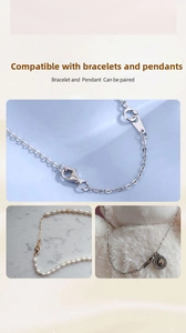 Detailed view of 14K gold-filled lobster clasps and extension chains for DIY jewelry making