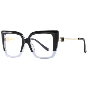 Oversized cat-eye glasses with black and lavender frame and gold metal temples