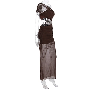 Detail of the brown ruched mesh fabric and side cutout on this one-shoulder dress