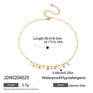 Detail of 18K gold stainless steel Y-chain with colorful star and heart charms