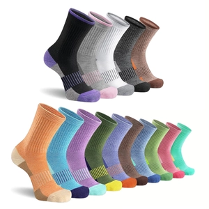 Selection of sixteen colorful athletic crew socks with reinforced arch and ribbed cuffs