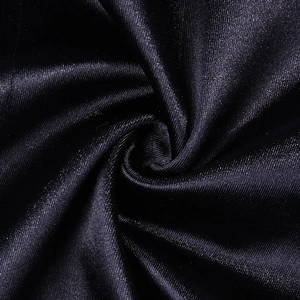 Detailed close-up of glossy black high-stretch fabric showing fine smooth texture