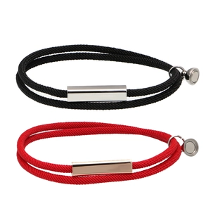 Magnetic couples bracelets with stainless steel bars in black and red rope design