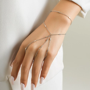 Minimalist silver palm chain bracelet with faux pearl and rhinestone link design