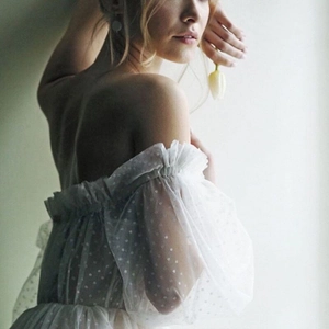 Elegant white polka dot mesh dress with off-shoulder neckline and ruffled puff sleeves