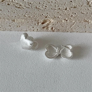 Minimalist S925 sterling silver heart-shaped stud earrings with a brushed matte finish