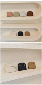 Minimalist semi-circle coin purses in seven colors with textured lychee pattern finish