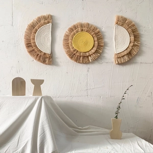 Bohemian raffia wall decor set with circular woven straw patterns for home interior