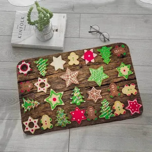 Close-up of rectangular Christmas floor mat with festive patterns on retro wood texture