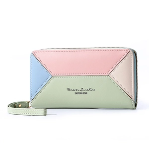 Close-up of color-block long wallet featuring pastel geometric patterns and wrist strap