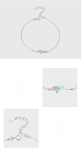 Detailed view of S925 sterling silver bow bracelet with 5A zircon and blue enamel inlay