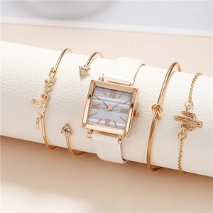 Women's square gold watch with white strap and four matching gold bracelets set