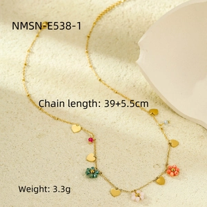 Detail view of gold flower necklace with heart pendant and colorful beads, length 39+5.5cm