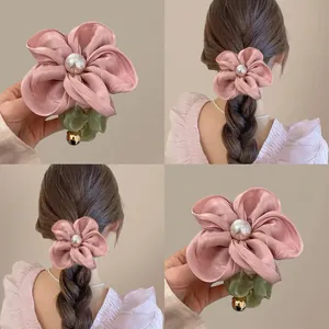 Pink floral satin scrunchie with white pearl center and green leaf detail for women