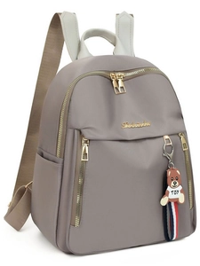 Gray Oxford fabric women backpack with gold zippers and a bear pendant on white background