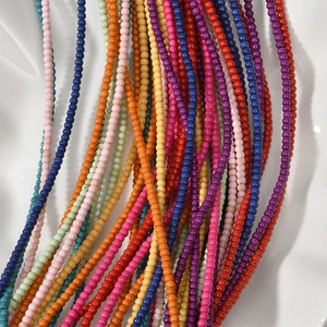 Close-up of colorful 3/4mm turquoise round loose beads for DIY jewelry making