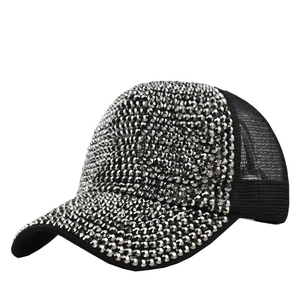 Detailed view of shimmering silver rhinestones and breathable black mesh on the baseball cap