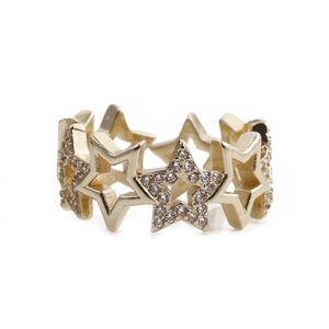 Adjustable golden star ring featuring alternating polished metal and white zircon stars
