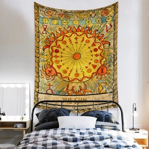 Detail of bohemian Sun Tarot wall tapestry with vintage yellow and orange aesthetic