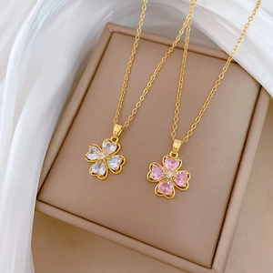 Titanium steel necklace set with heart-shaped crystal clover pendants in a gift box