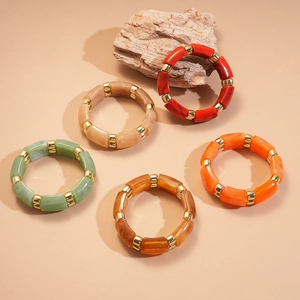 Five-piece acrylic geometric stretch bracelet set in diverse vintage colors with gold beads