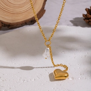 Elegant 18K gold plated heart pendant necklace with baroque pearl on a textured stone plate