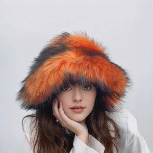 Detail shot of fluffy orange and black striped faux fur hat worn by a model for winter