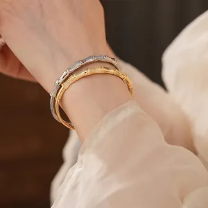 Gold and silver bamboo-shaped cuff bracelets with sparkling zircon stones for women