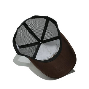 Internal view showing breathable black mesh and cotton brim of this vintage trucker hat
