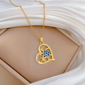 Gold heart turtle necklace for mom with blue enamel and sparkling crystal accents