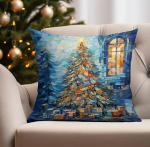 Christmas pillowcase with stained glass tree pattern displayed on a cozy sofa