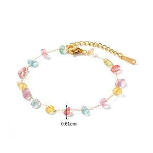 Detail view of colorful beads on a gold necklace with a 0.61cm width measurement