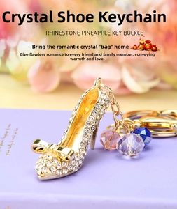 Detail view of crystal high heel keychain with gold plating and multicolor beads
