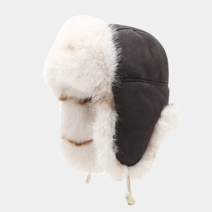 Deep grey faux suede trapper hat with white faux fur lining and ear flaps for winter warmth