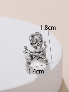 Detailed view of silver skull crossbones ring with dimensions 1.8cm by 1.4cm marked
