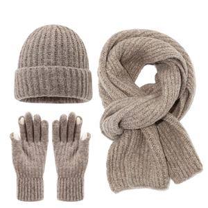 Oatmeal knit winter set featuring a cuffed beanie, long scarf, and touchscreen gloves
