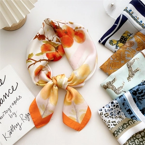 Elegant 70cm silk square scarf with orange floral pattern and equestrian chain prints
