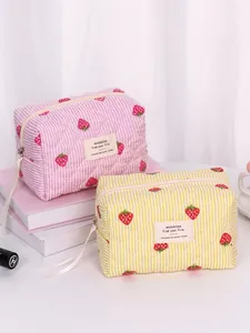 Set di pochette per trucchi trapuntate a righe rosa e gialle con stampa fragola