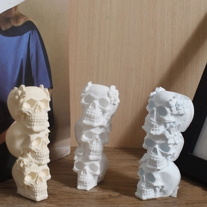 Three-tier skull candle holder set with floral relief carvings for Halloween decoration