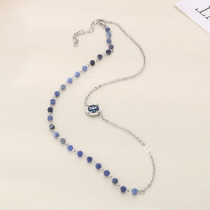 Stainless steel star compass necklace with blue beaded chain and silver link design