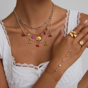 Layered 18K gold stainless steel necklace with pearl flower charms and ring bracelet set