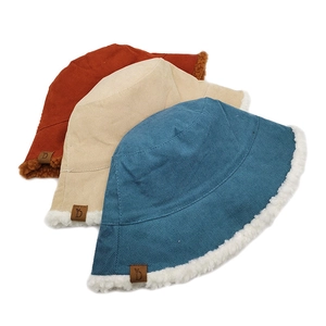 Three-color corduroy lamb wool bucket hats in caramel, beige, and peacock blue colors