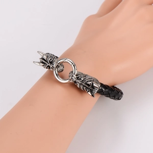 Handcrafted leather bracelet for men featuring a vintage silver wolf head charm