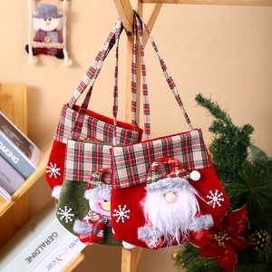 Christmas gift bags with Santa and Snowman designs, plaid handles and snowflake embroidery