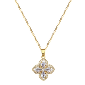 Elegant gold titanium steel necklace featuring a sparkling clover pendant with zircons