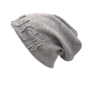 Thick grey knit beanie with Lucky letter patch for women in a casual winter style