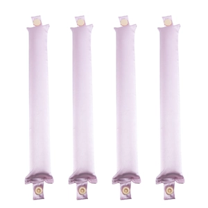 Detail showing four pink satin heatless hair curlers with button closures on white surface