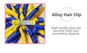 Detail view of yellow and blue grosgrain ribbon flower on an alloy duckbill hair clip