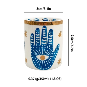 Detailed size specifications for the ceramic Hamsa eye mug showing height and capacity