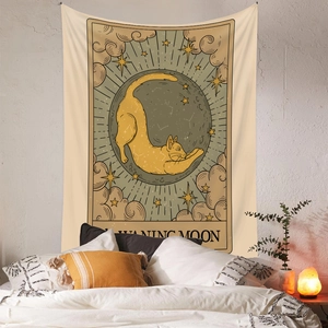 Bohemian tarot style tapestry featuring a yellow cat on moon with Waning Moon text